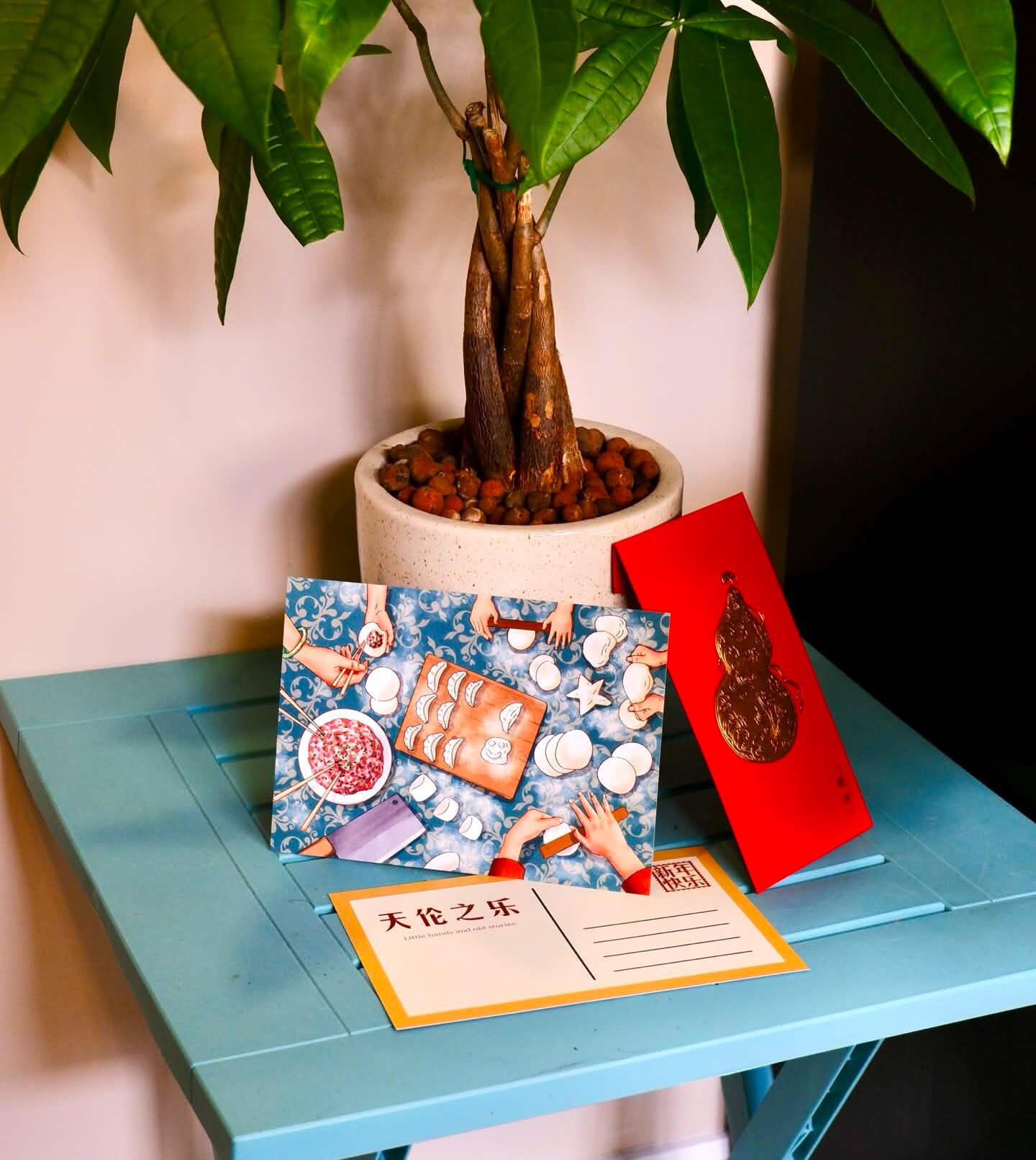 Dumpling time! postcard with its back and a red envelope